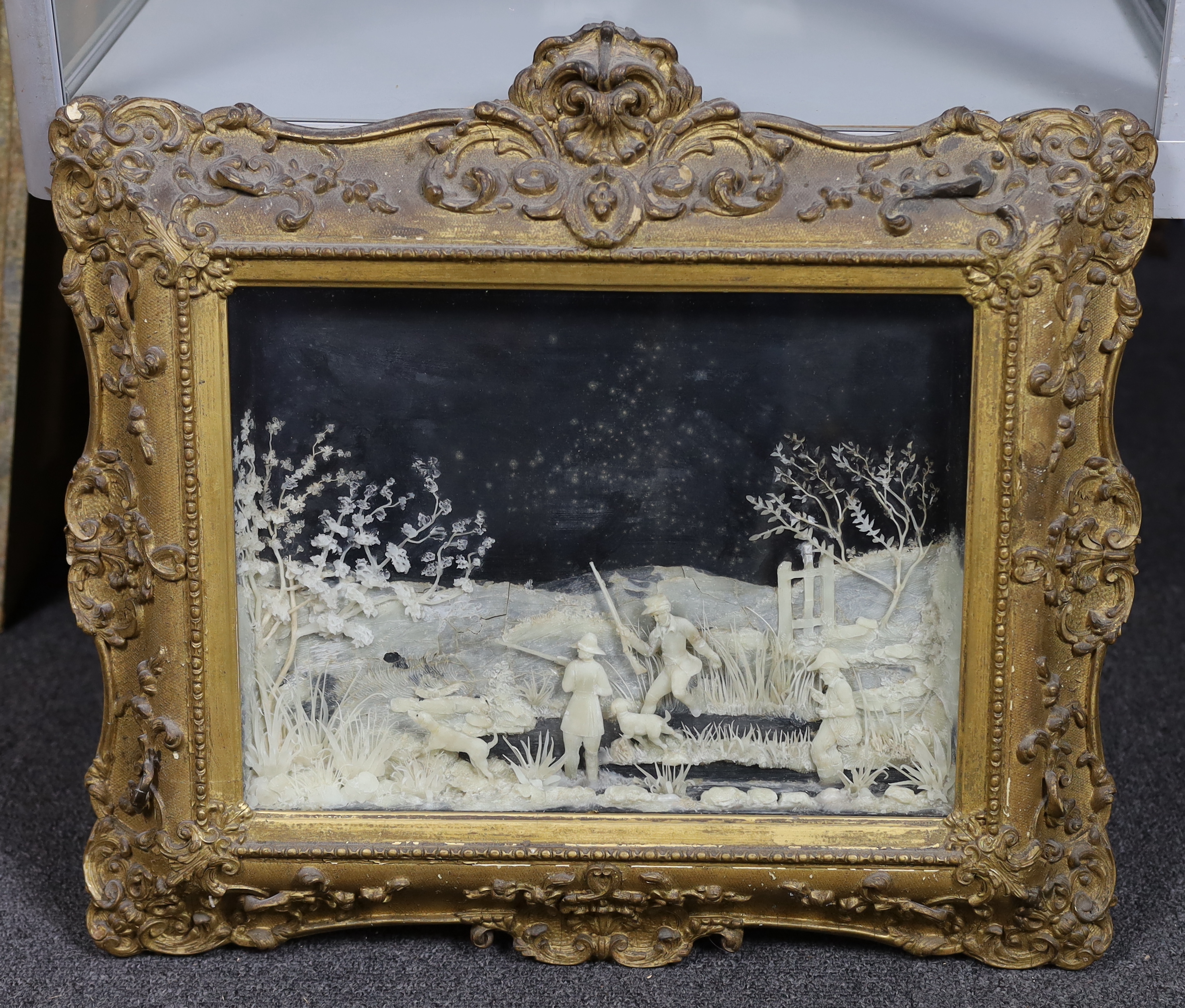 A rare pair of mid 19th century carved wax pictures, 26 x 36cm, original gilt gesso frames